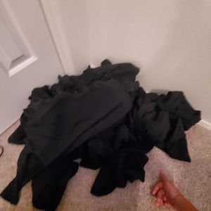 About 30 black leggings